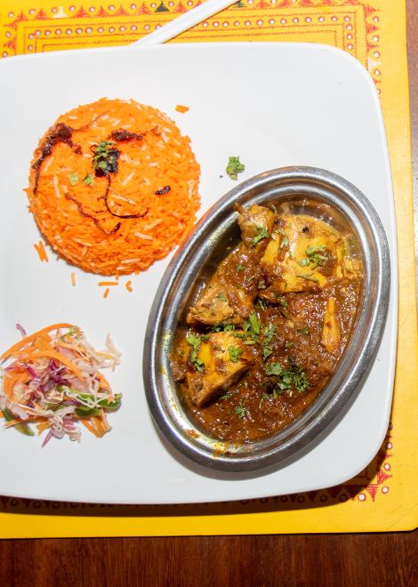 Fragrant biriani ya nyama served with creamy bamia la nazi and tender baby aubergines.