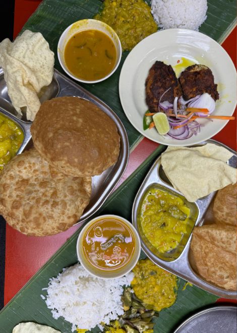 Fragrant banana leaf curries with fluffy steamed rice.