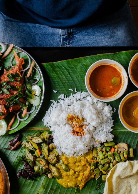 Fragrant banana leaf curries with fluffy steamed rice.