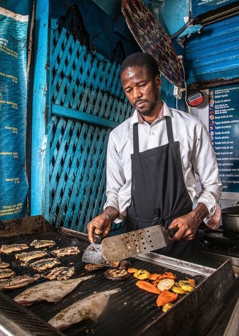 Cook fish from the market at a local restaurant