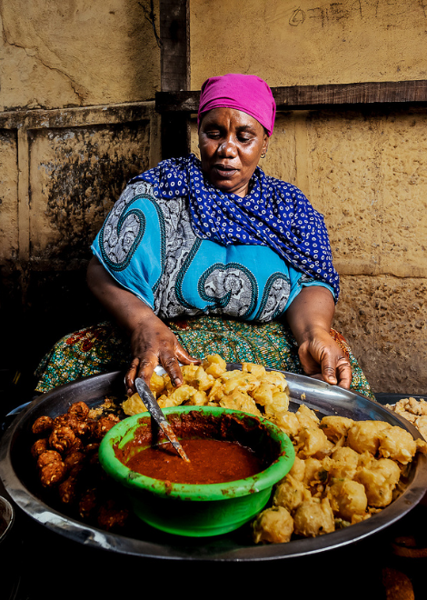 Visit a mix of street vendors and local eateries across old Mombasa