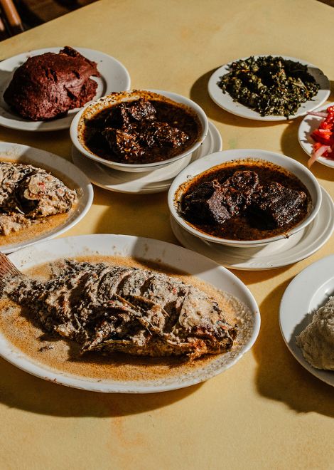 Samaki wa kupaka, tilapia in coconut with creamed African nightshade