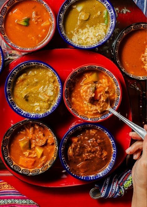 Three Guatemalan classics: pulique de pollo, pepián de pollo and jocón.