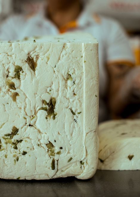 Creamy queso de capita flecked with fragrant loroco flowers.