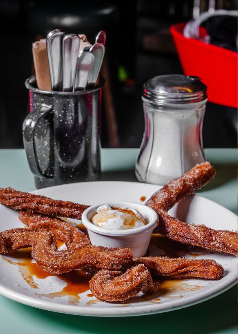 Sign off on a sweet note with crisp, fried churros