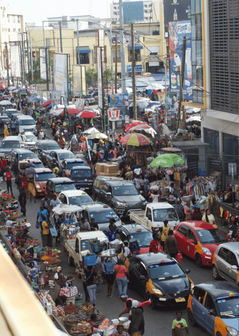 Experience the colour and chaos of Accra's Makola Market.