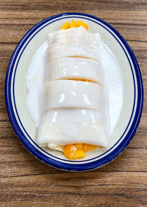 Conclude on a sweet note with mango wrapped in coconut milk jelly.