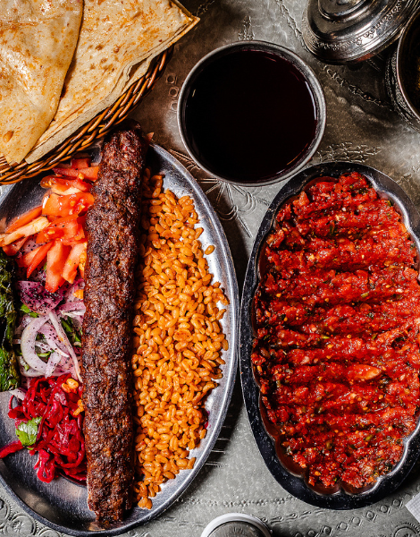 Adana kebab with tomato pepper acili ezme dip