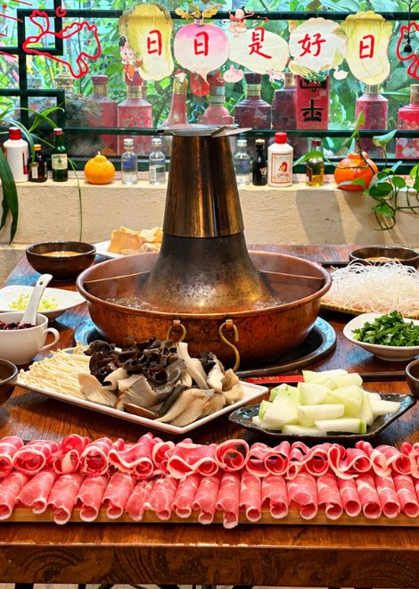 Gather round a classic copper chimney hotpot.