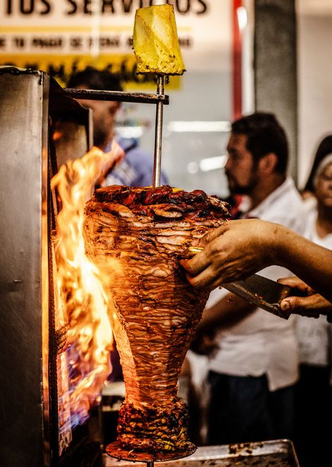 Fiery al pastor on the trompo 