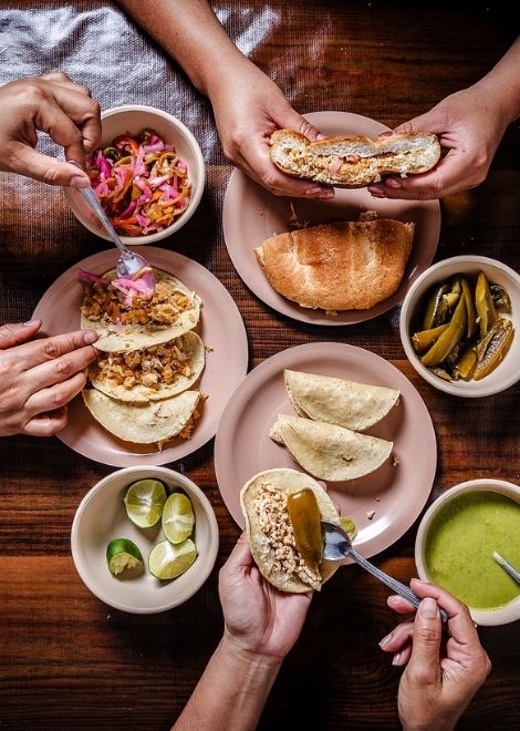 Roasted pork lechón tacos and tortas