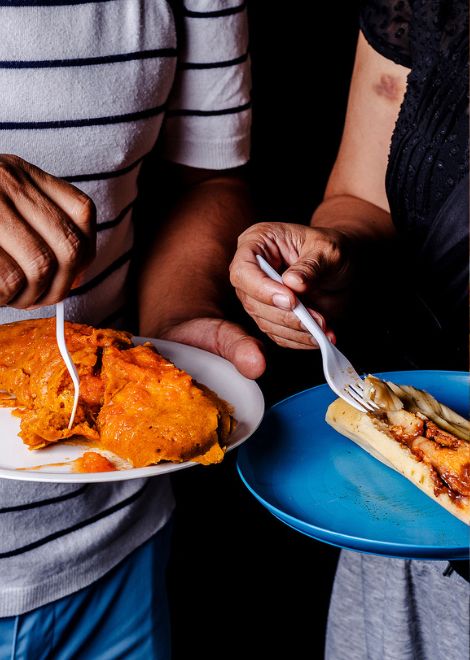 Tamal stuffed with complex mole and torteado chicken tamal
