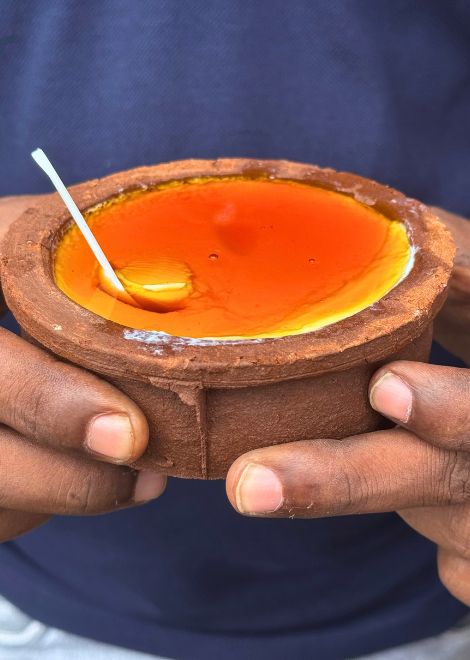 Creamy buffalo curd drizzled with sweet, sticky treacle.