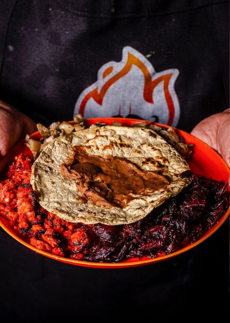 Spanish-style spicy chistorra sausage and hibiscus flower tinga stew