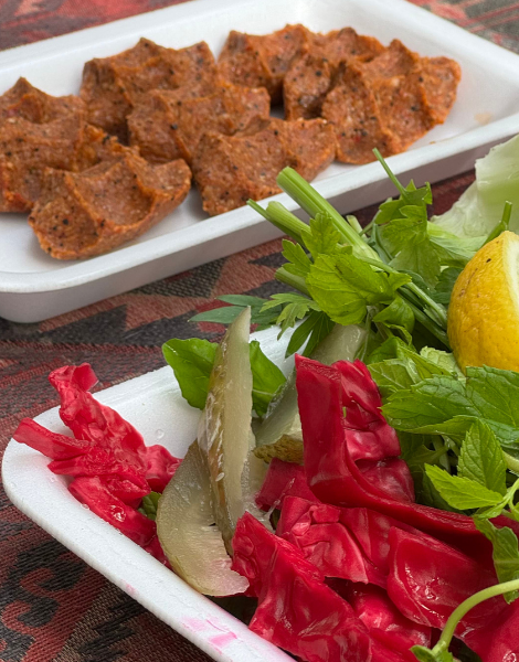Hand-kneaded bulgur patties, tucked into beds of crispy lettuce