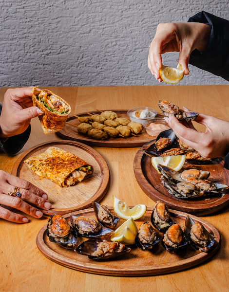 Feast on balık dürüm fish wrap and midye dolma mussels