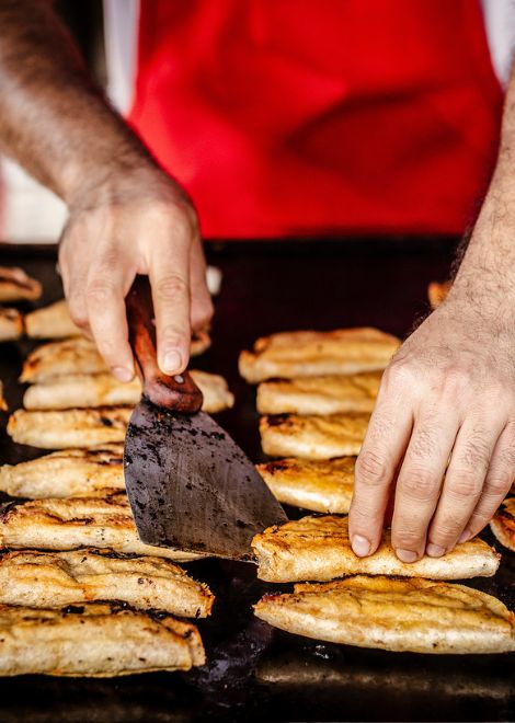 Traditional goat birria taco with consome de birria