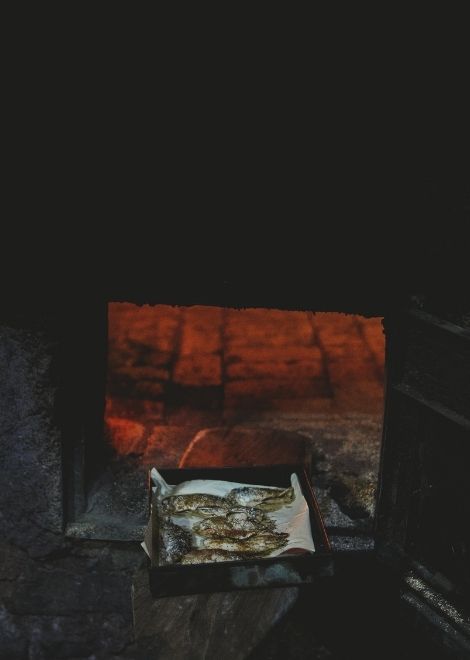 A tray of sardines straight from the wood-fired oven