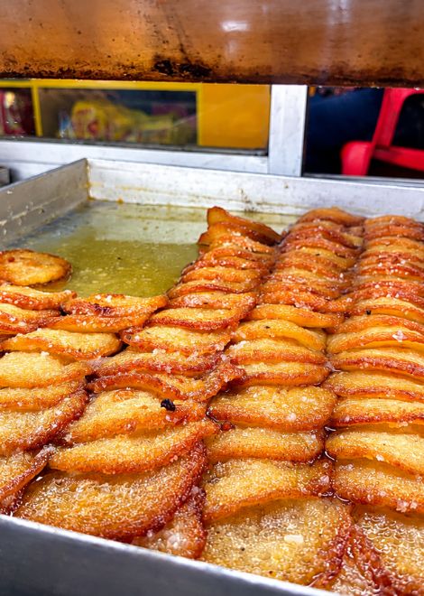 Golden, syrup-soaked malpua, Varanasi's sweetest pancake.