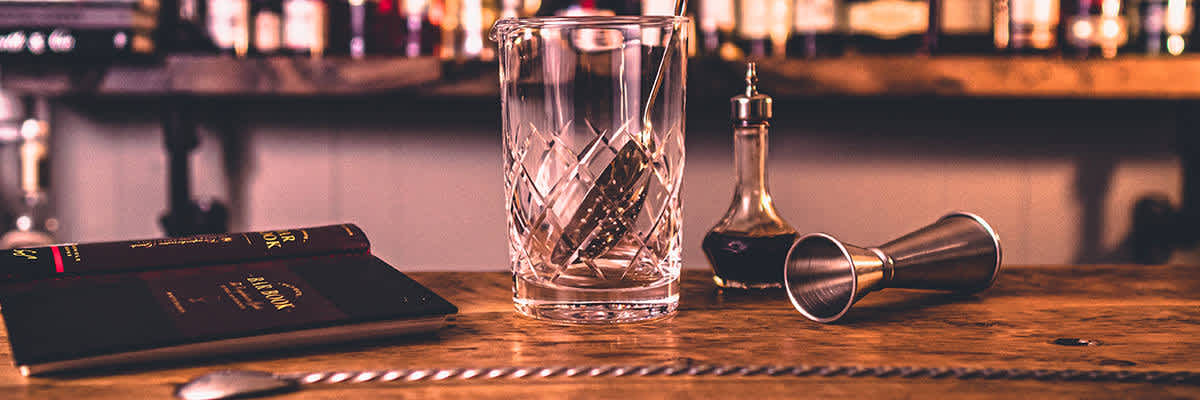 mixing glass on bar