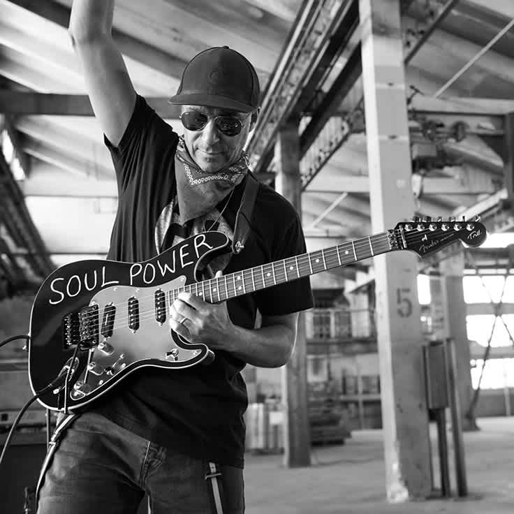 Learn chords and riffs to Tom Morello songs like “Driving to Texas,” “Can't  Stop the Bleeding,” and more.