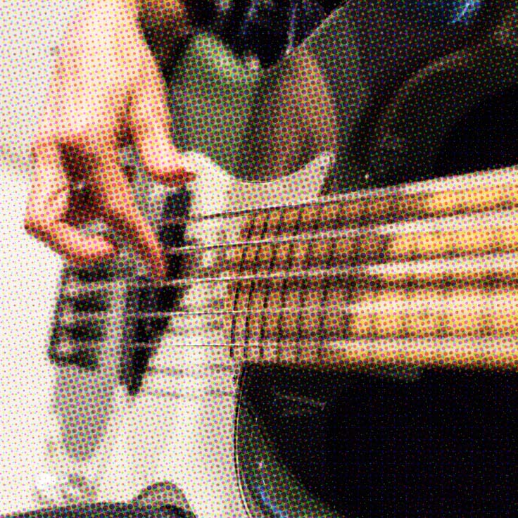 playing bass with a pick