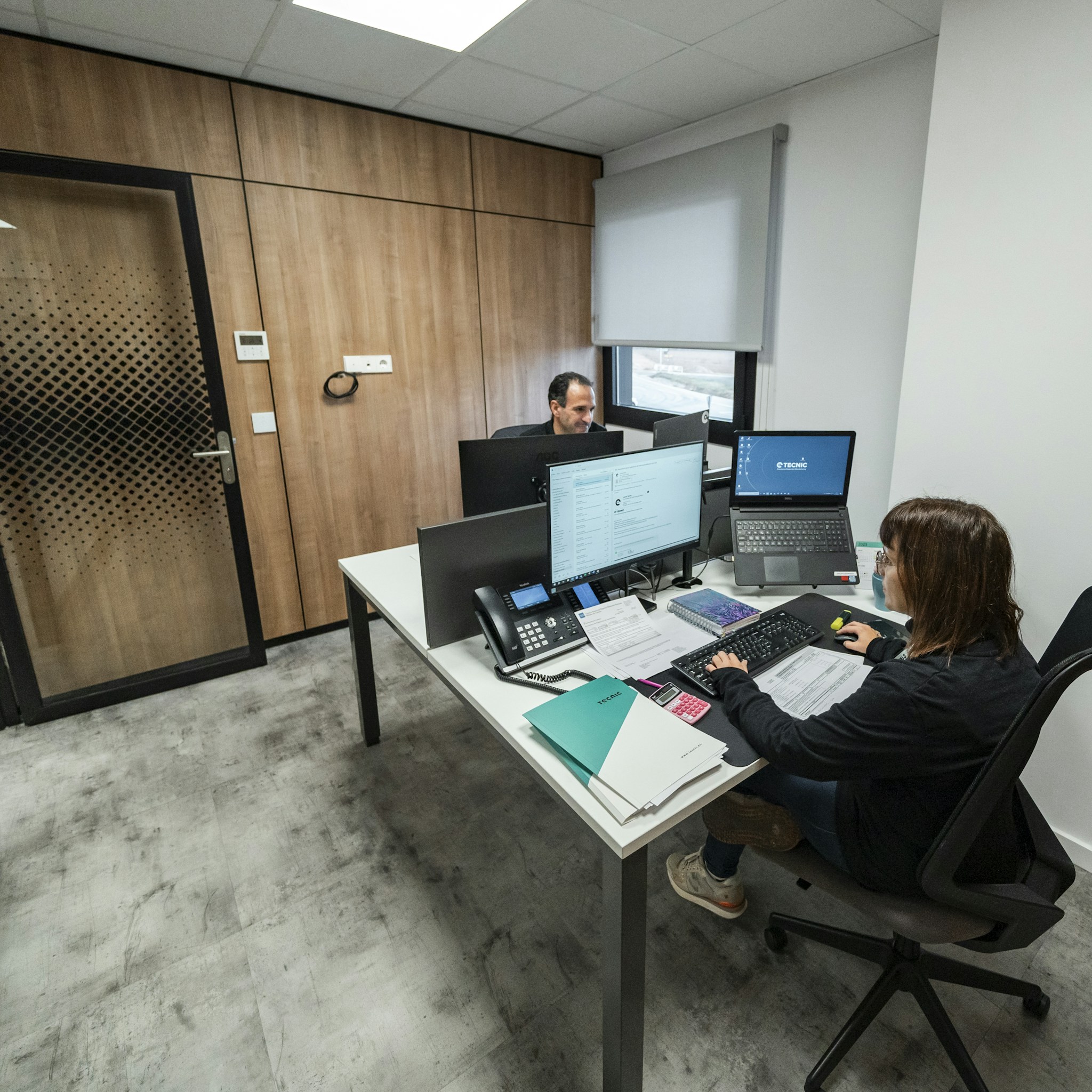 Modern, clean office environment with natural light.