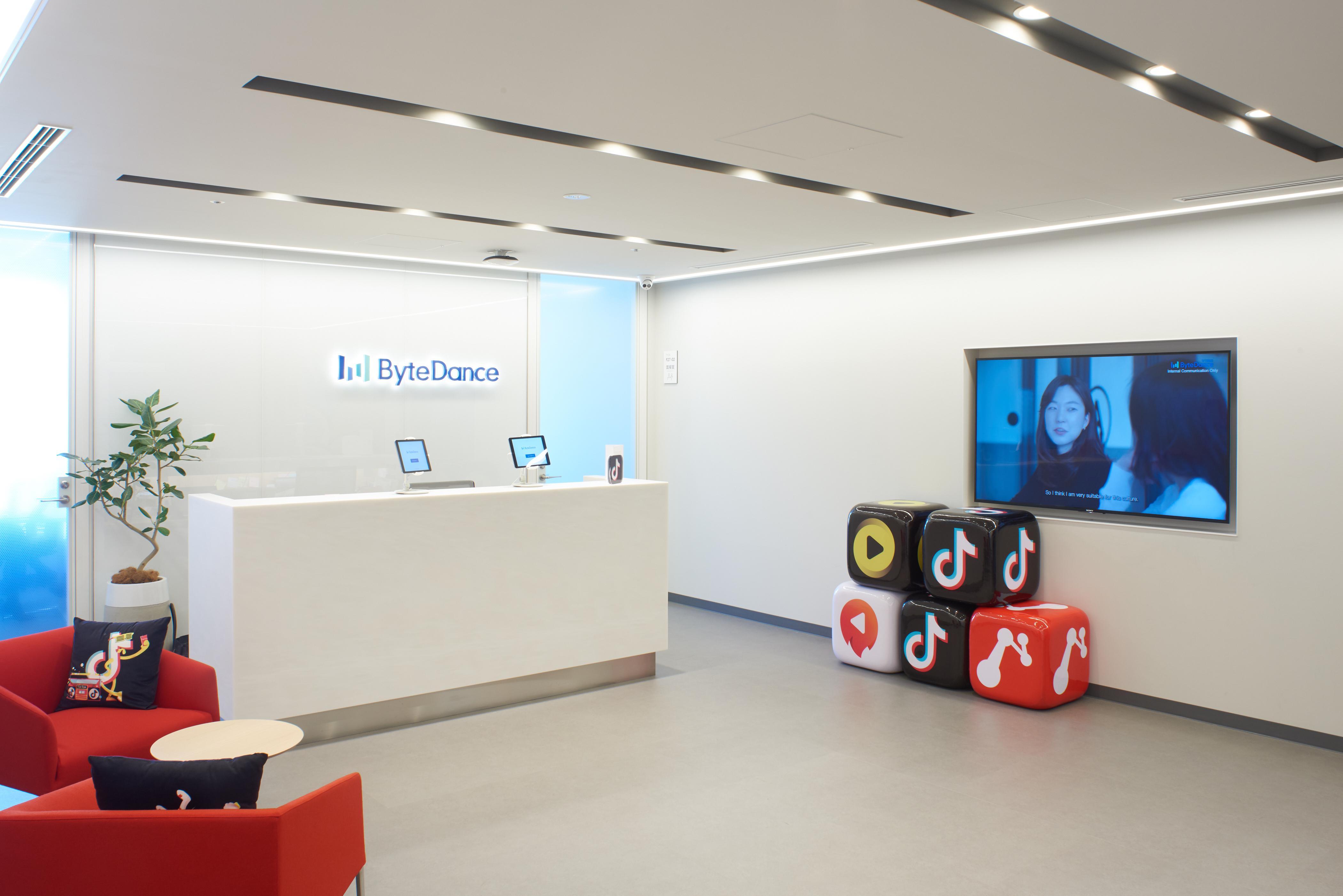 Modern, minimalist office interior, representing a tech company's workspace.