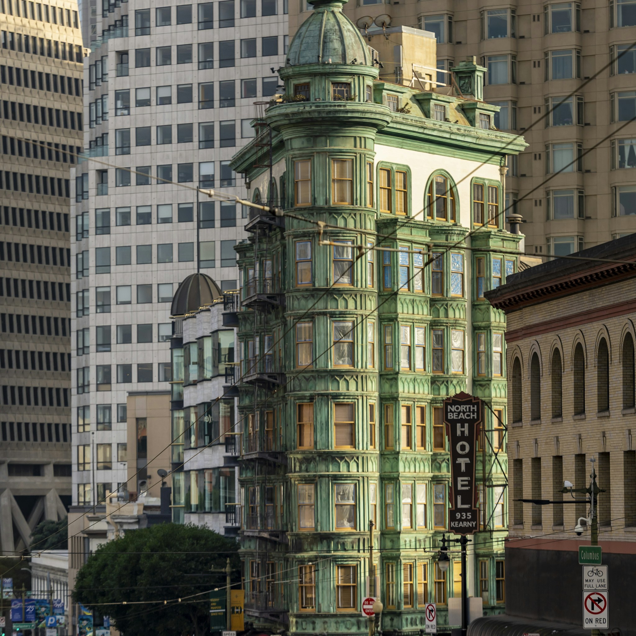 Street view of San Francisco's North Beach neighborhood, showing urban architecture.