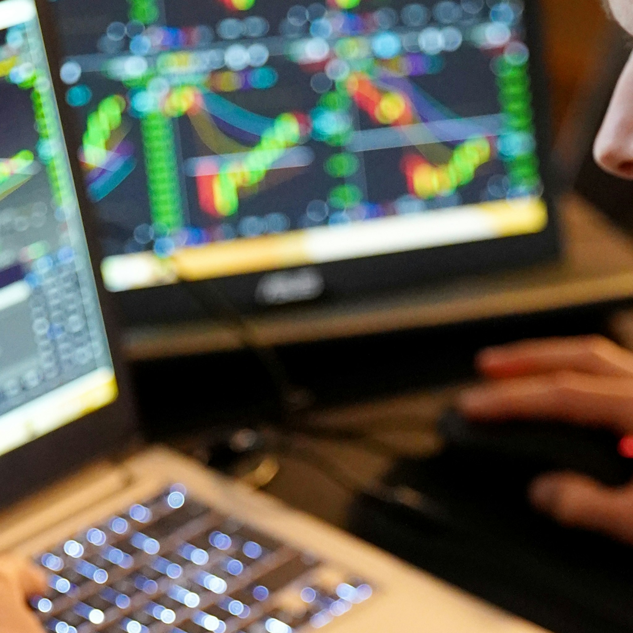 Man analyzing financial data on a computer, representing Medvi's impressive profit margins.