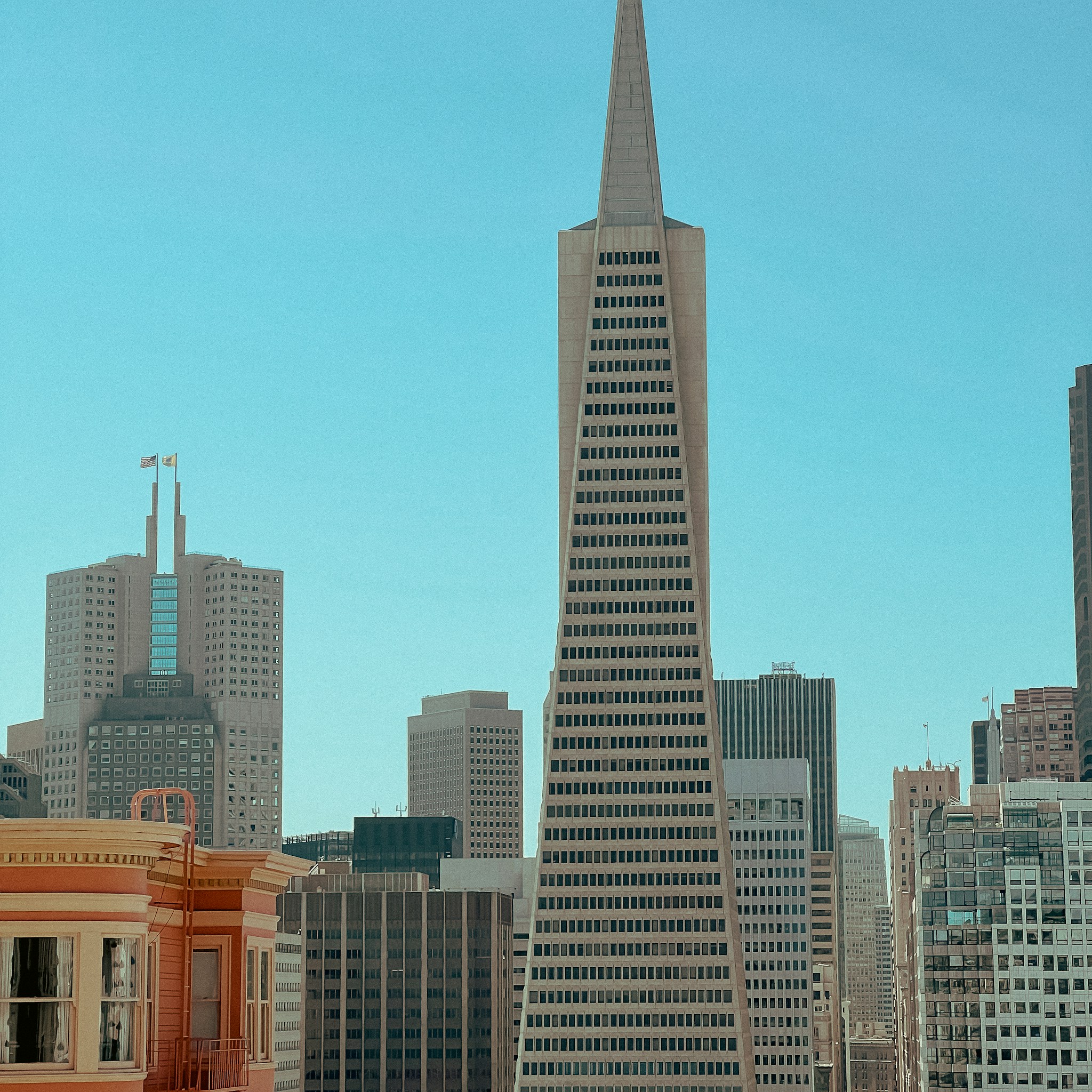 Panoramic view of the San Francisco Bay Area skyline at dusk.