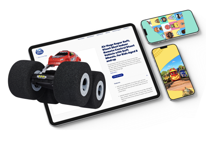 Spinmaster app screens displayed on a tablet and mobile devices