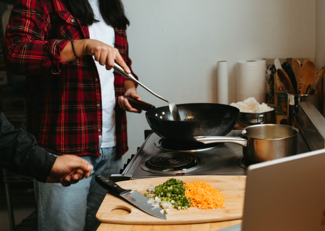 Couple cooking at home.