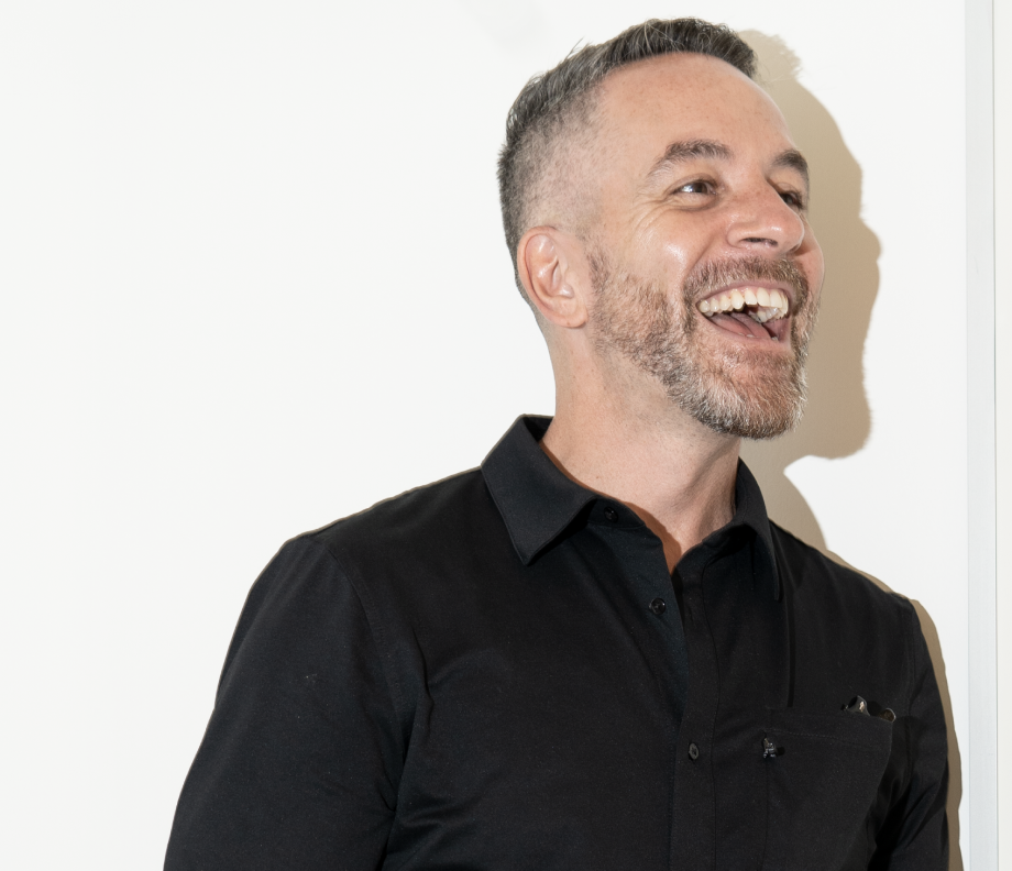 Headshot of Jay laughing