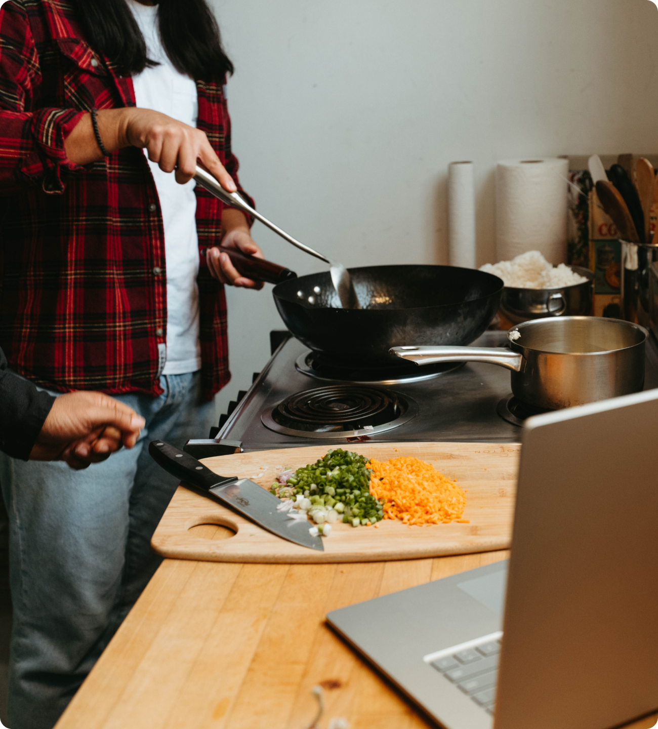 Couple cooking at home.