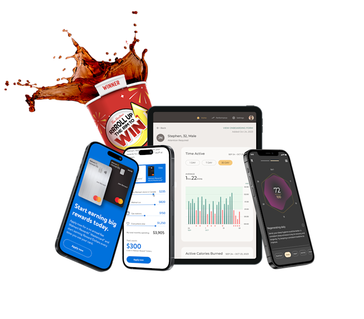 Image of a mobile devices and a tablet with coffee cup in the back.