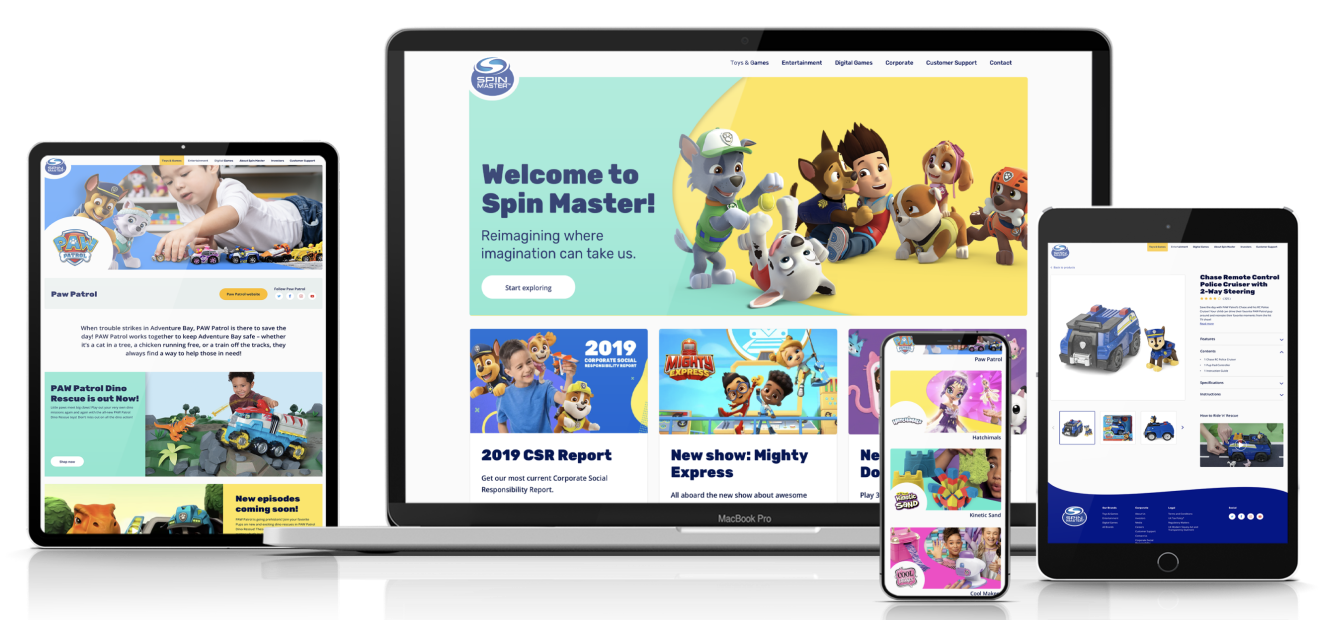 A collection of various devices displaying the Spinmaster website.