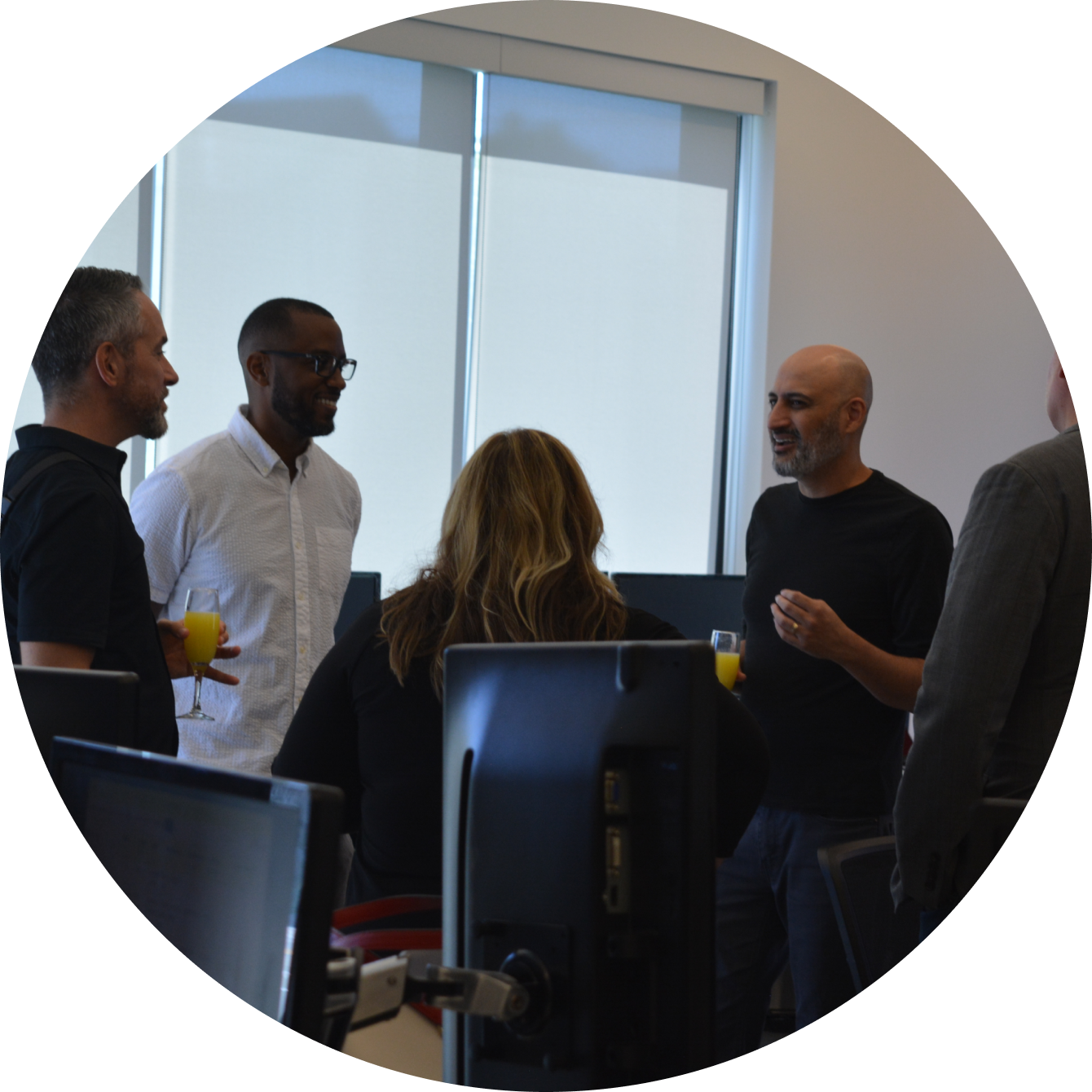 A group of people in the middle of conversation