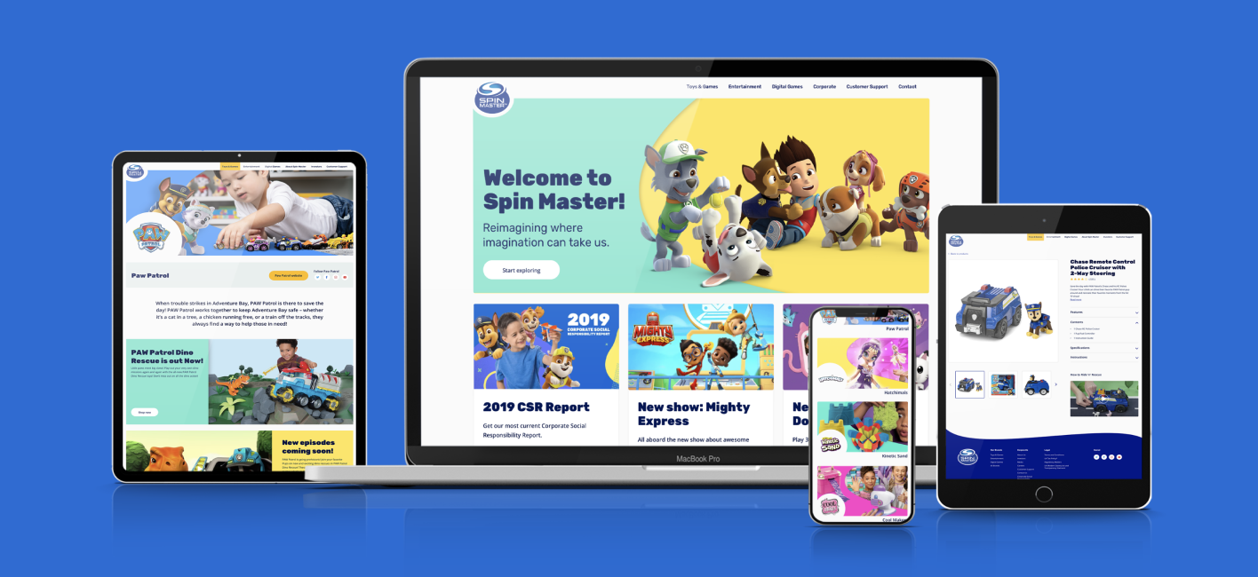 A collection of various devices displaying the Spinmaster website.