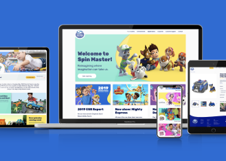 A collection of various devices displaying the Spinmaster website.