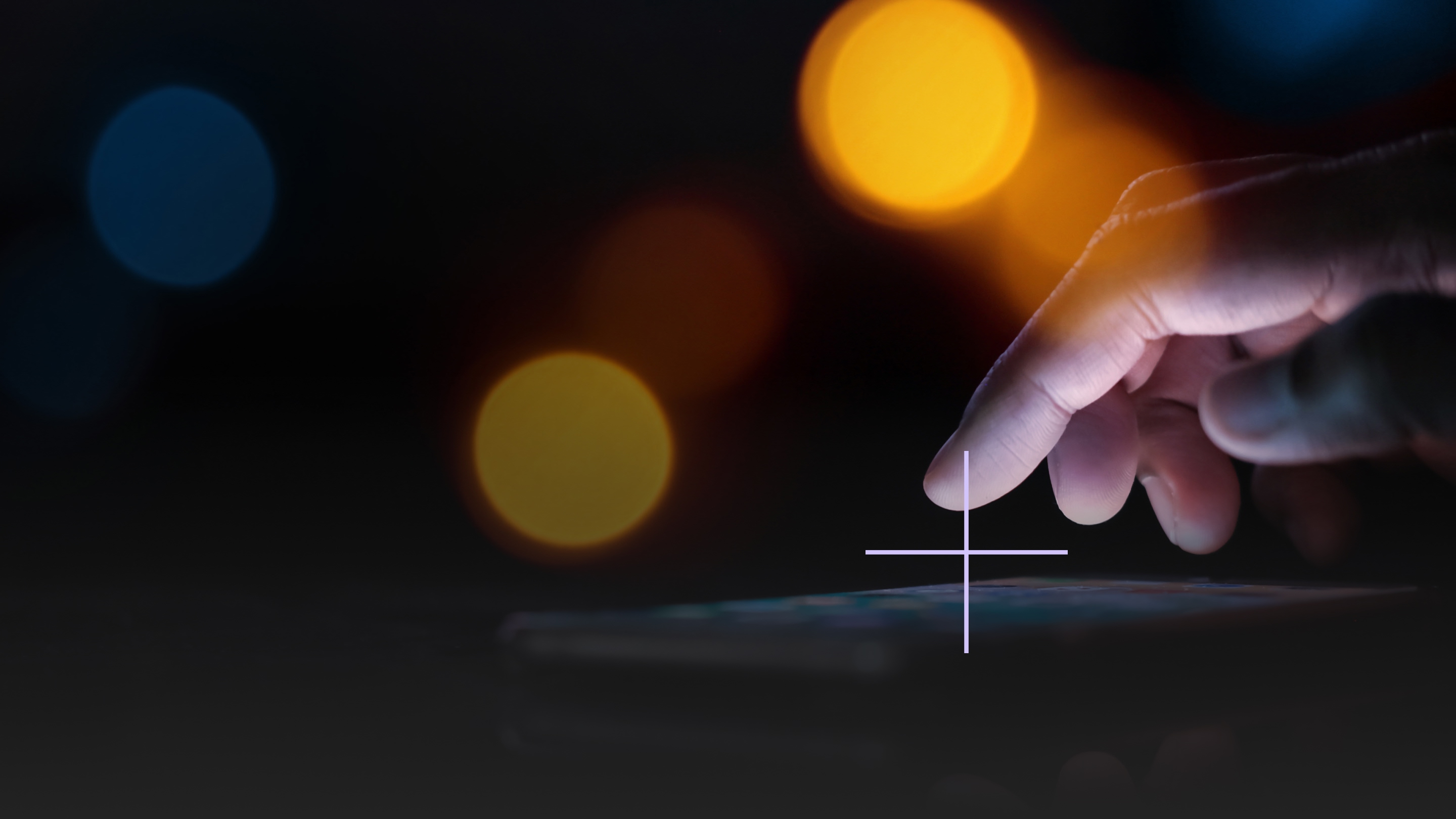 Person using screen on a device.