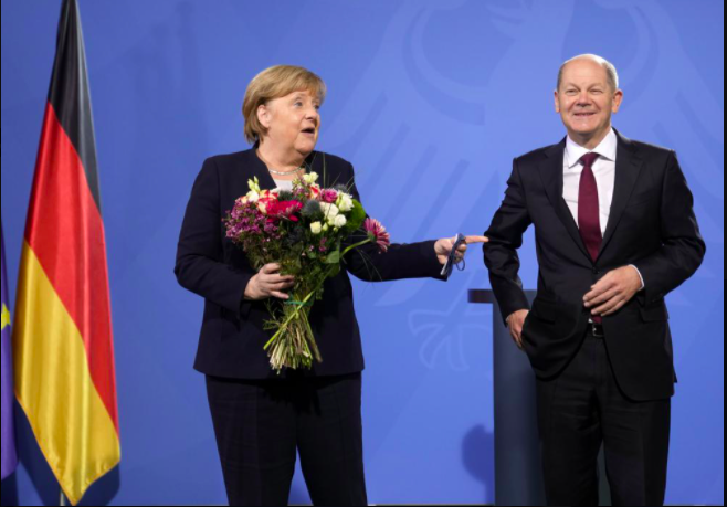 Former Chancellor Merkel and current Chancellor Olaf Scholz| Photo by Markus Schreibe