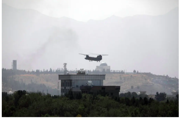 Helicopter over US Embassy in Kabul|Photo by Rahmat Gul/Associated Press