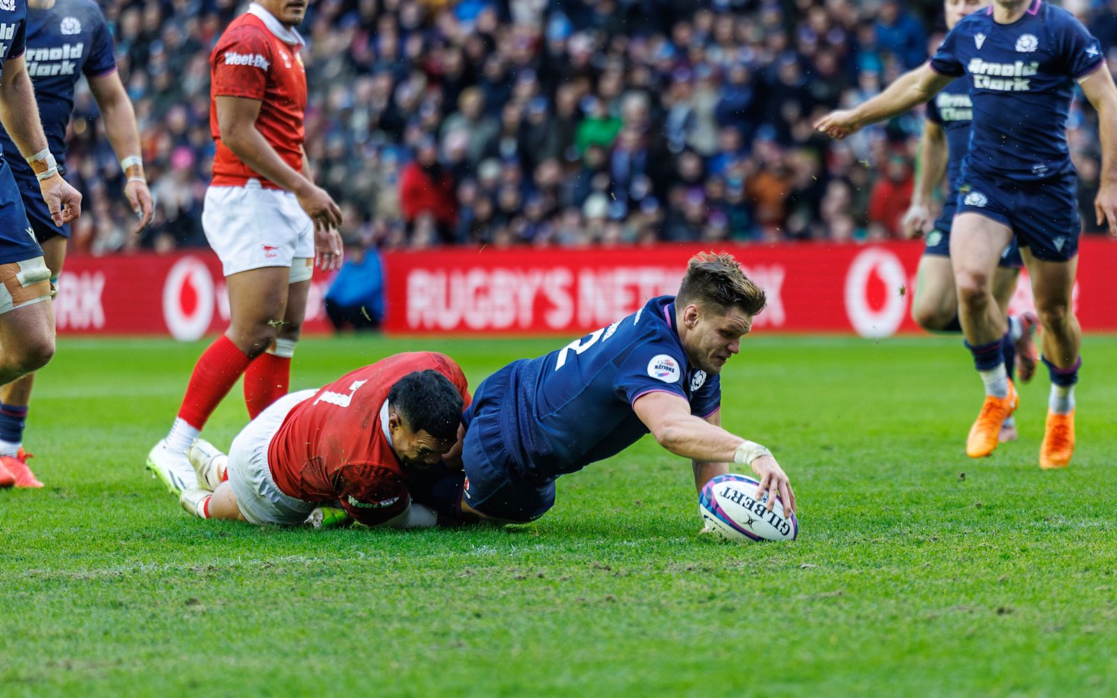 George Turner diving over for Scotland