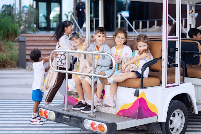 Half-term Edition Kids at the back of a buggy