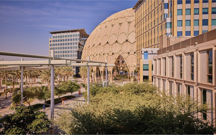 offices-gallery-al-wasl A view of Al Wasl dome with surrounding buildings and one of the venues leading to the dome