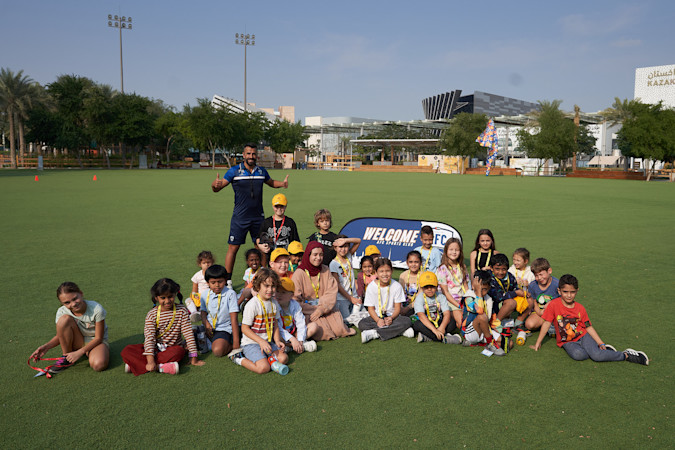 Half-term Edition Group Picture of the Kids on the Grass