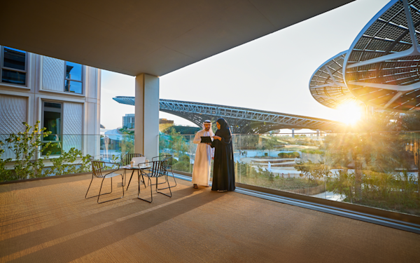 Emiratisation Emirati man and women at a terrace