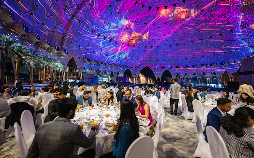 Iftar under the dome People having having dinner under Al Wasl dome