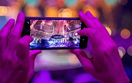 Al Wasl guest taking a photo Al Wasl guest taking a photo